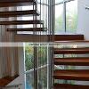 Solid Hardwood Staircase installation project, Miami Beach, Florida.Martinez Wood Floors Inc.