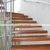 Solid Hardwood Staircase installation project, Miami Beach, Florida.Martinez Wood Floors Inc.