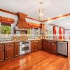 Exotic Wood Floors refinishing project, Space: Kitchen, Coral Gables, Florida.Martinez Wood Floors Inc.